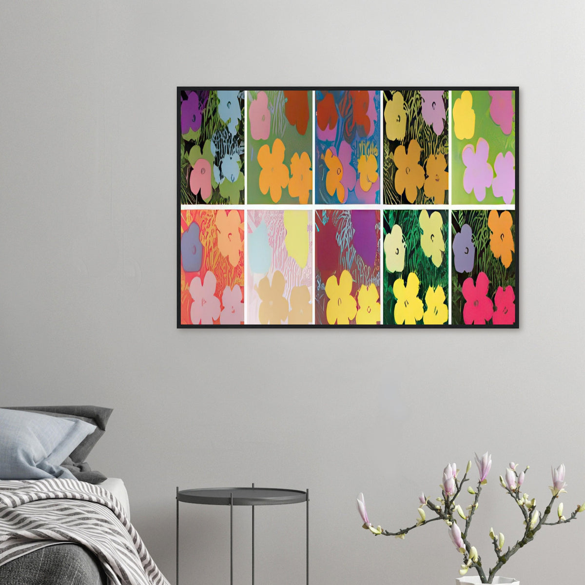Andy Warhol framed print depicting repeated hibiscus-like blossoms with simplified petals and strong silhouettes, a detail that connects the composition to its broader artistic subject
