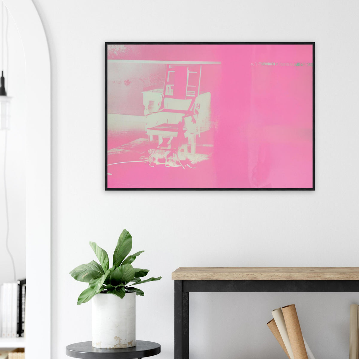 Andy Warhol framed print depicting the stark chair, its surroundings and the tense emptiness of the room, a detail that connects the composition to its broader artistic subject