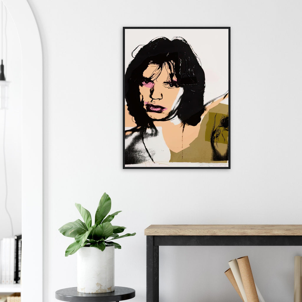 Andy Warhol framed print depicting warhol limits photographic detail and redraws facial features, giving Jagger’s lips a particularly vivid pink accent; Warhol’s ten Mick Jagger portraits followed a long friendship with the Rolling Stones singer, including