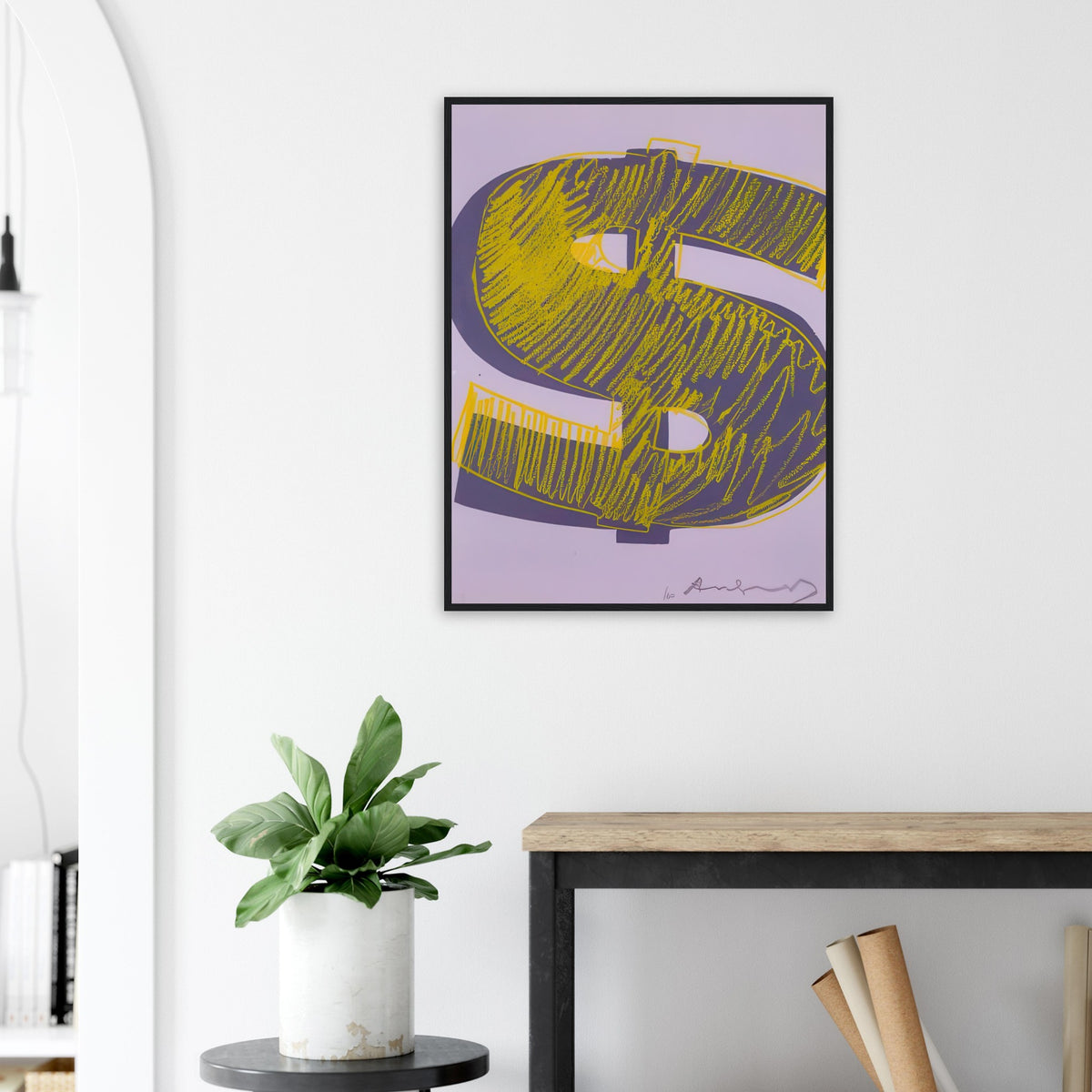 Andy Warhol framed print depicting the repeated or isolated currency mark operates like a logo: simple, recognizable and assertive