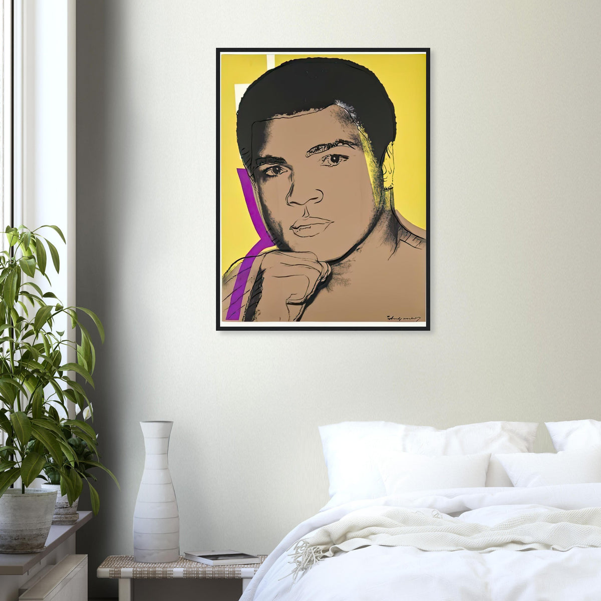 Andy Warhol framed print depicting ali turns toward the viewer with a raised fist; yellow, purple and white colour accents sharpen his focused gaze; The Muhammad Ali portfolio was developed from Warhol’s photographs of the celebrated boxer after sports