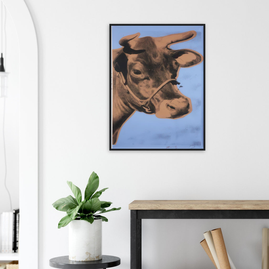 Andy Warhol framed print depicting the cow’s face becomes a bold graphic presence, replacing the gentle mood of traditional animal painting with irreverent visual impact