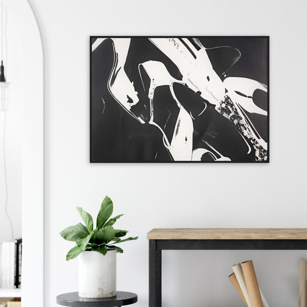 Andy Warhol framed print depicting a lively arrangement of footwear, with overlapping silhouettes and decorative texture, a detail that connects the composition to its broader artistic subject