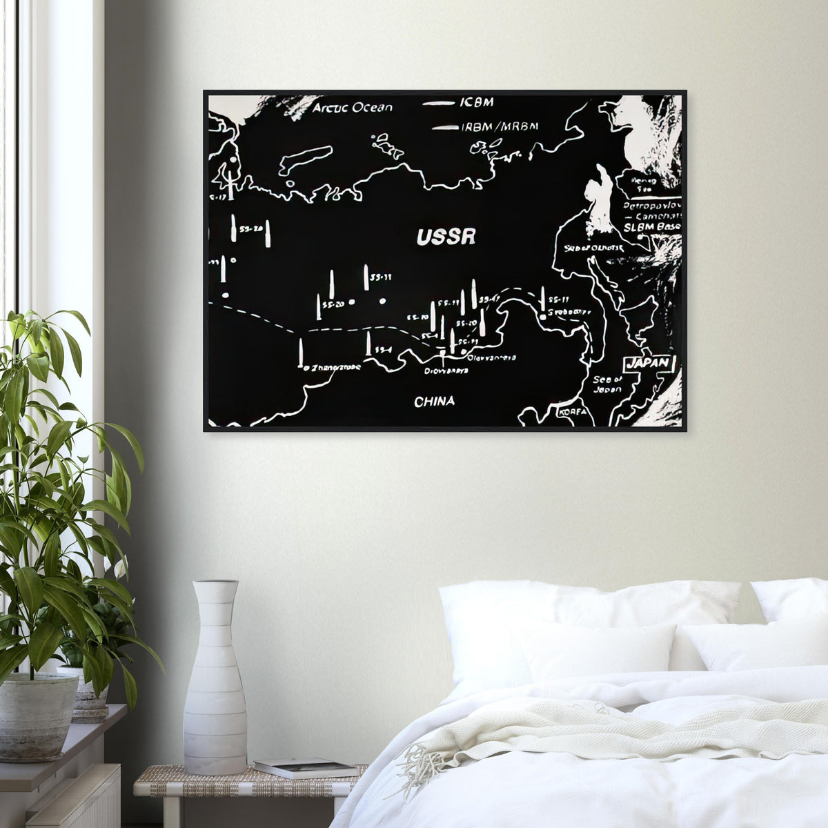 Andy Warhol framed print depicting cartographic outlines and strategic map markings, a detail that connects the composition to its broader artistic subject