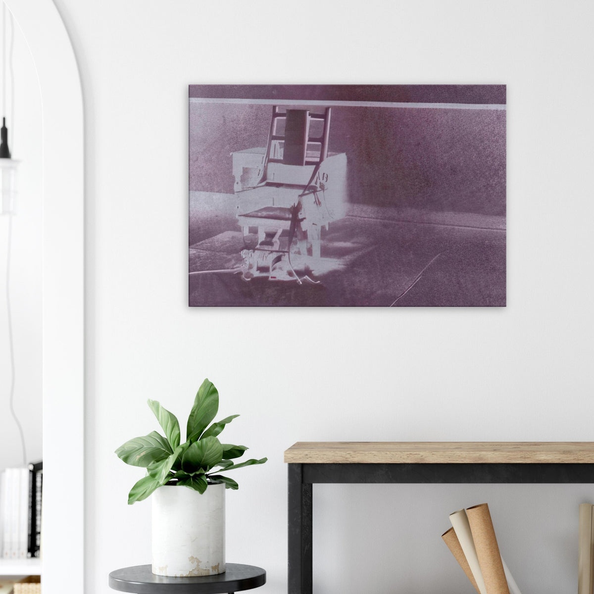 Andy Warhol canvas print depicting the stark chair, its surroundings and the tense emptiness of the room, a detail that connects the composition to its broader artistic subject