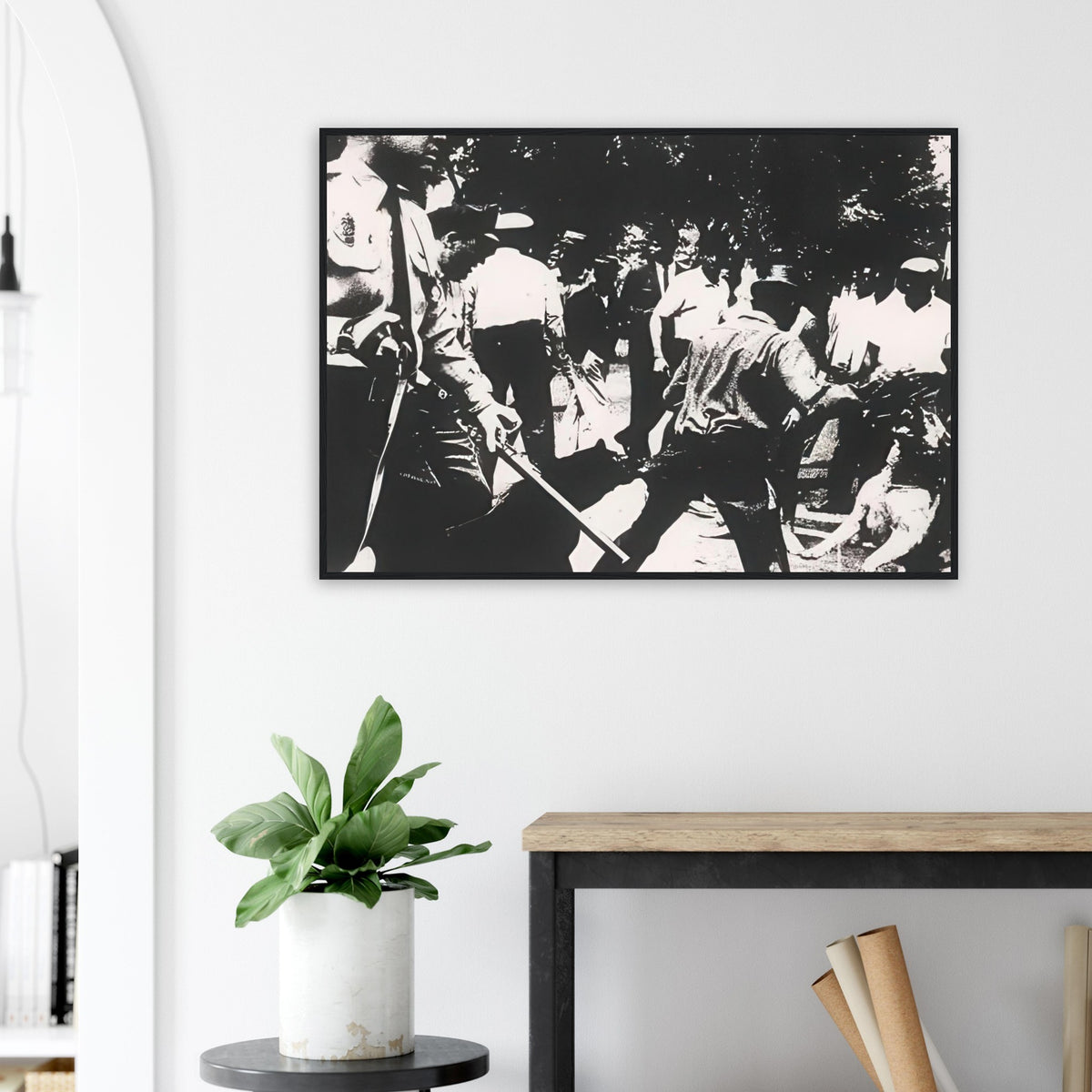 Andy Warhol framed print depicting the tense scene of a civil-rights protest and its violent repression, a detail that connects the composition to its broader artistic subject