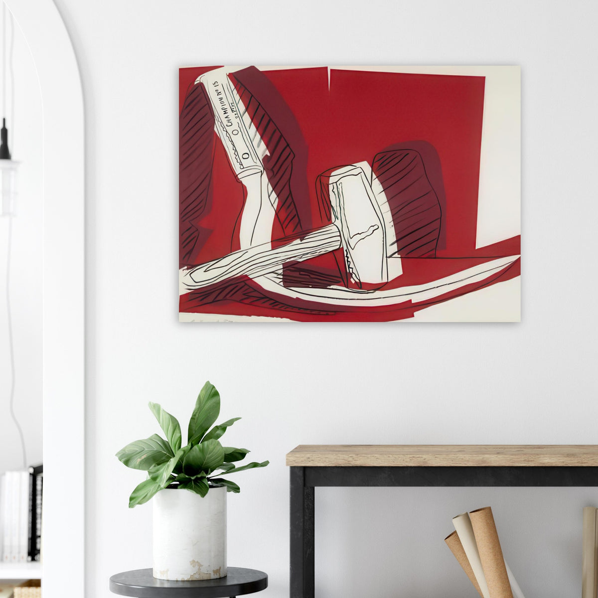 Andy Warhol poster depicting the industrial hammer and curved sickle as emphatic, intersecting shapes, a detail that connects the composition to its broader artistic subject