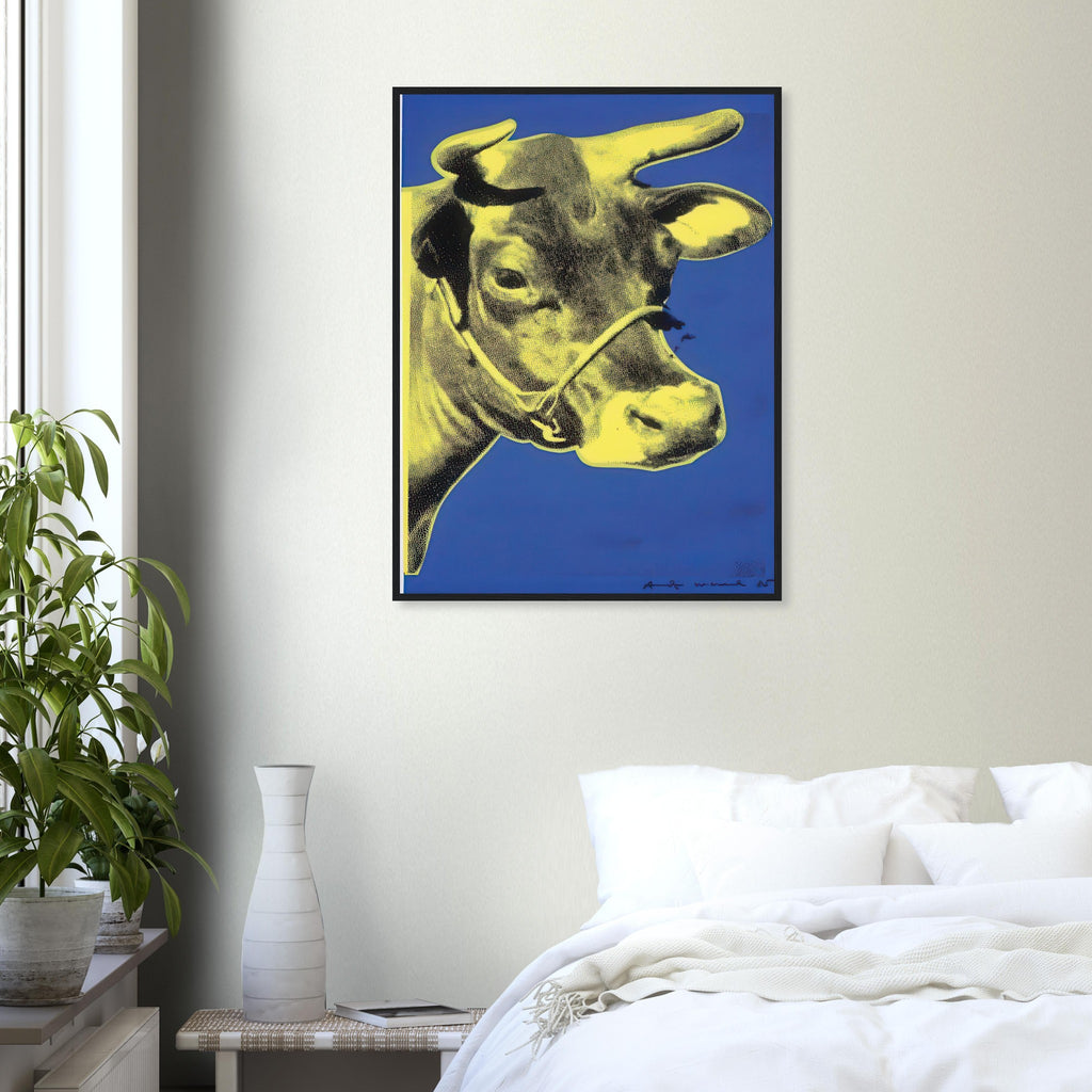 Andy Warhol framed print depicting the cow’s face becomes a bold graphic presence, replacing the gentle mood of traditional animal painting with irreverent visual impact