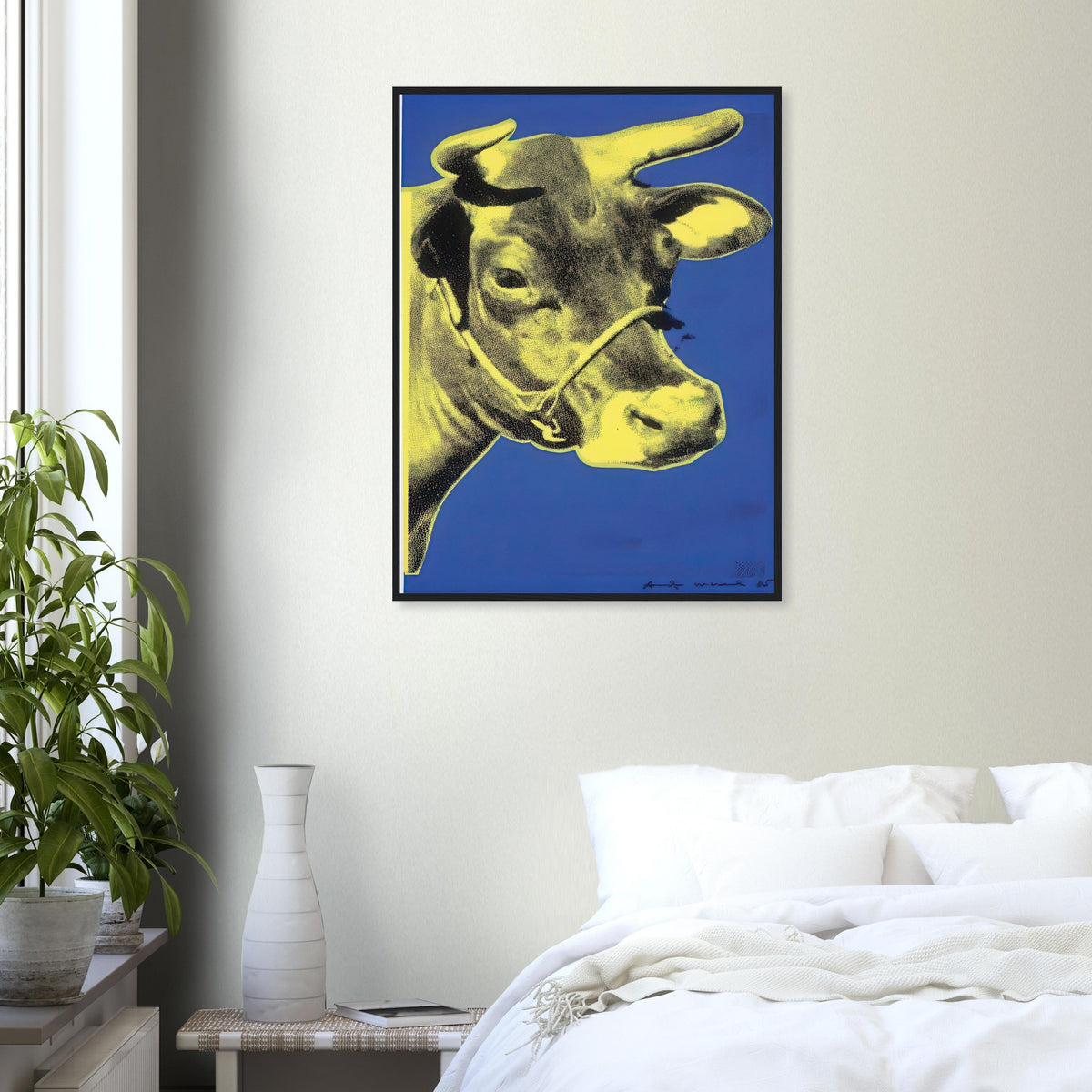 Andy Warhol framed print depicting the cow’s face becomes a bold graphic presence, replacing the gentle mood of traditional animal painting with irreverent visual impact