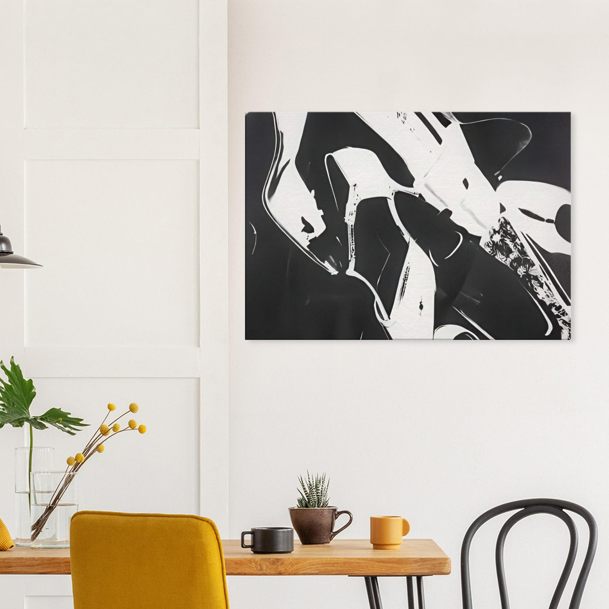 Andy Warhol canvas print depicting a lively arrangement of footwear, with overlapping silhouettes and decorative texture, a detail that connects the composition to its broader artistic subject