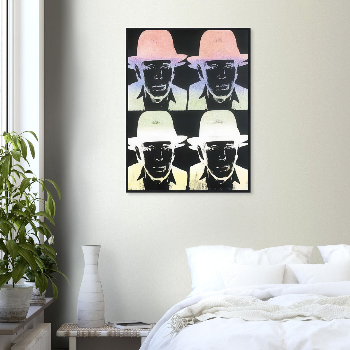 Andy Warhol framed print depicting dark facial areas are crossed by pastel ombré highlights, with the hat and jacket emerging from near-black tones; Warhol portrayed fellow artist Joseph Beuys after photographing him in 1979