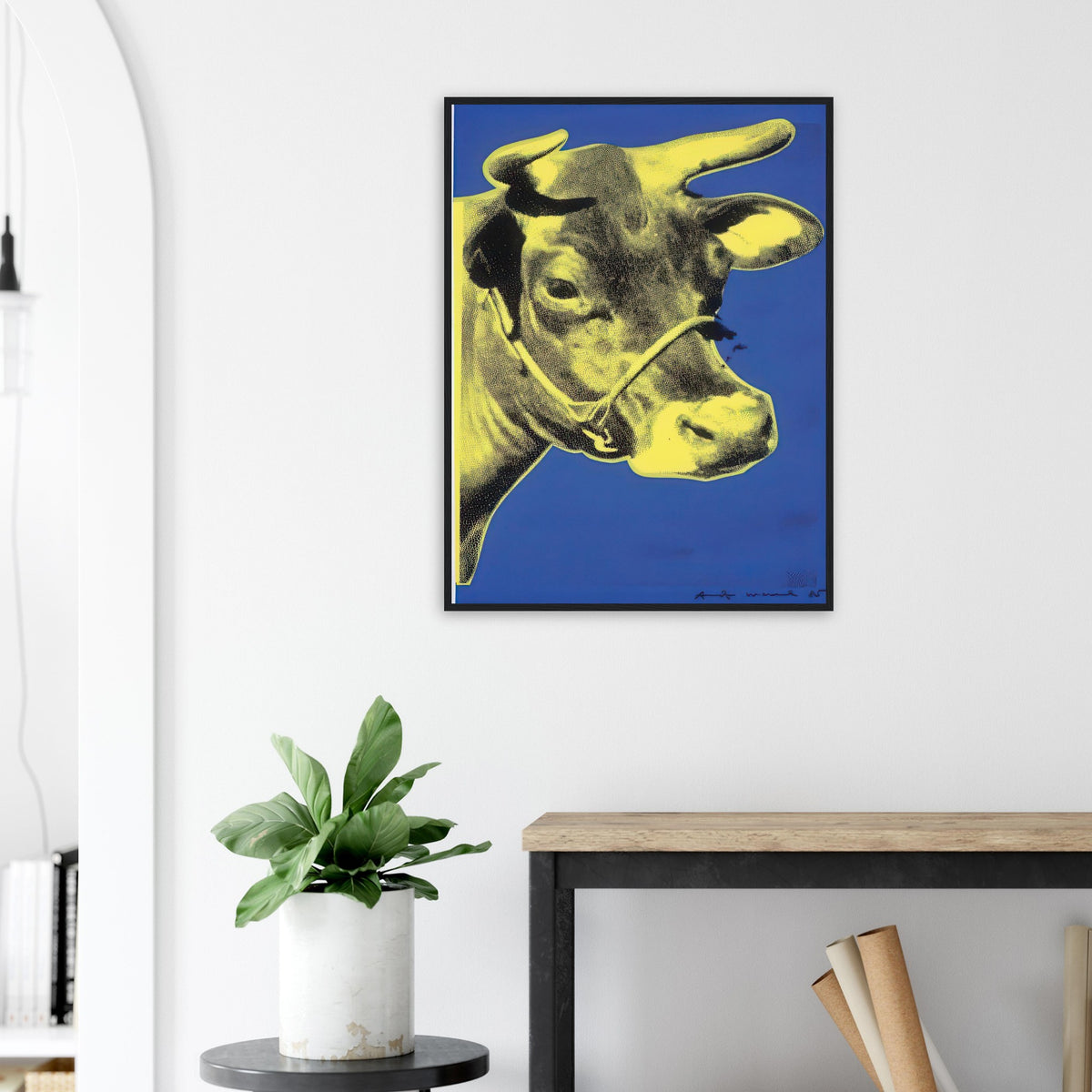 Andy Warhol framed print depicting the cow’s face becomes a bold graphic presence, replacing the gentle mood of traditional animal painting with irreverent visual impact