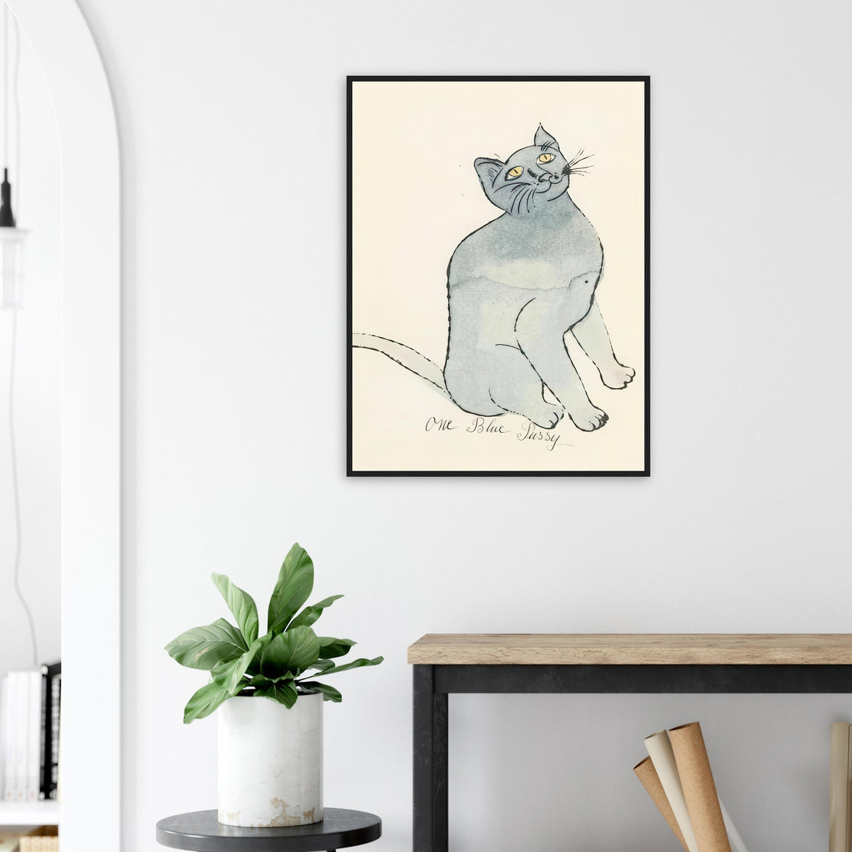 Andy Warhol framed print depicting a spare contour drawing gives the animal its personality, while uncomplicated forms keep the focus on the cat’s outline and pose