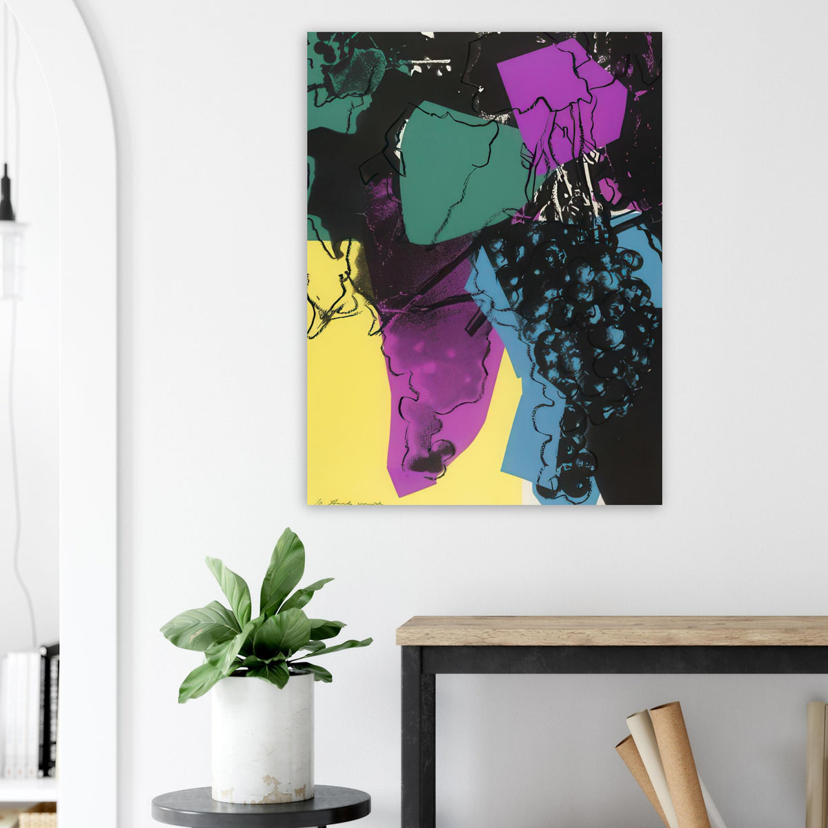 Andy Warhol poster depicting rounded grape forms and flowing stems provide a decorative rhythm, while the composition feels more graphic than naturalistic