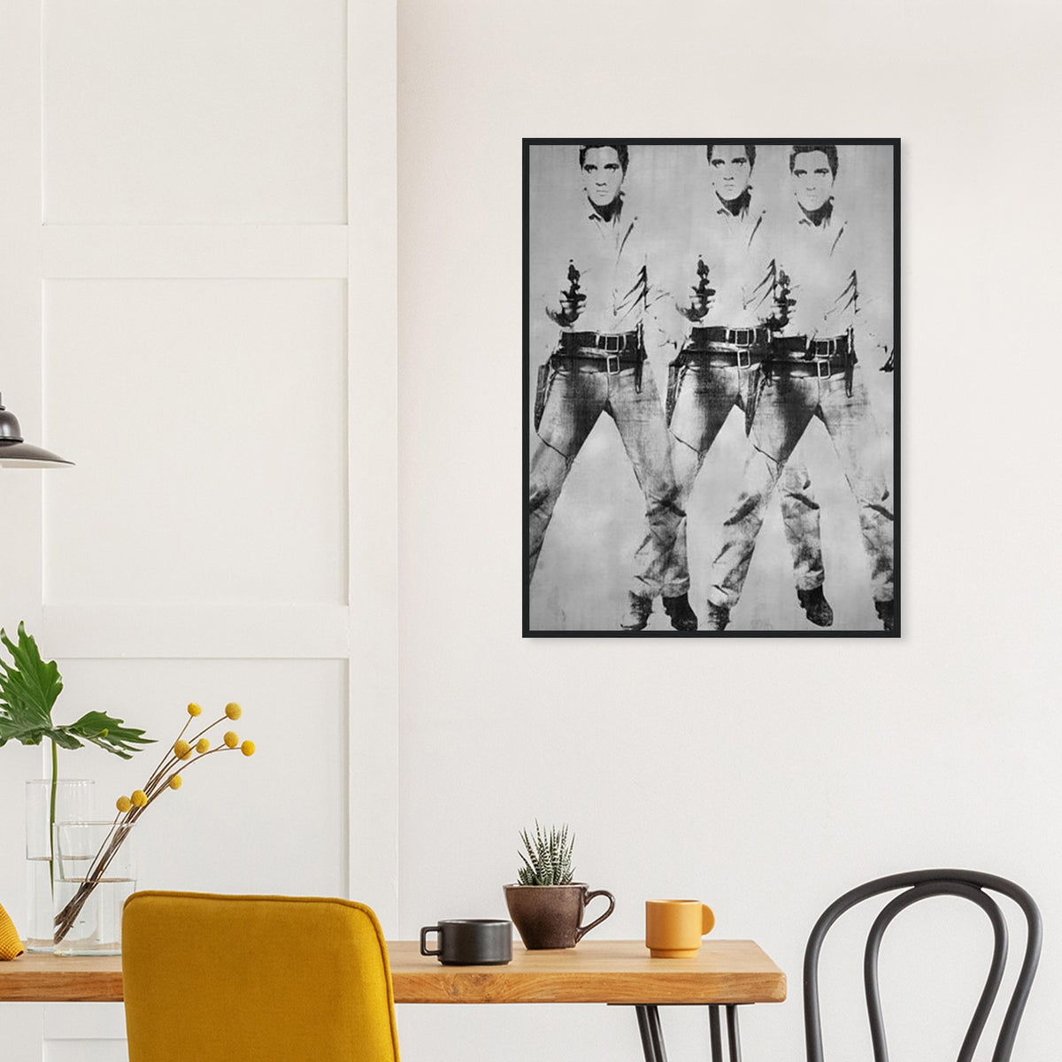 Andy Warhol framed print depicting a repeated standing figure in Western costume amplifies the rhythm of the pose, blending the visual language of a publicity still with a repeated screen image; Warhol’s multiple-Elvis imagery grew from publicity photographs of Elvis Presley in his Western-film