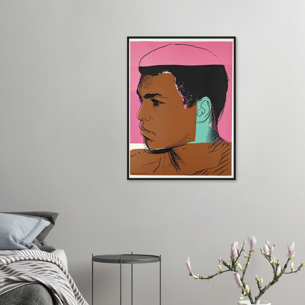 Andy Warhol framed print depicting ali appears in profile against coral-pink colour; Warhol draws the hairline back into a partly obscured photographic silhouette; The Muhammad Ali portfolio was developed from Warhol’s photographs of the celebrated boxer after sports