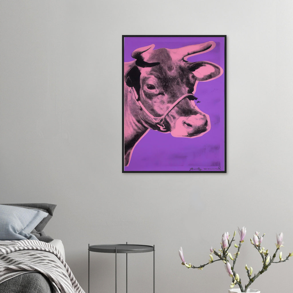 Andy Warhol framed print depicting the cow’s face becomes a bold graphic presence, replacing the gentle mood of traditional animal painting with irreverent visual impact