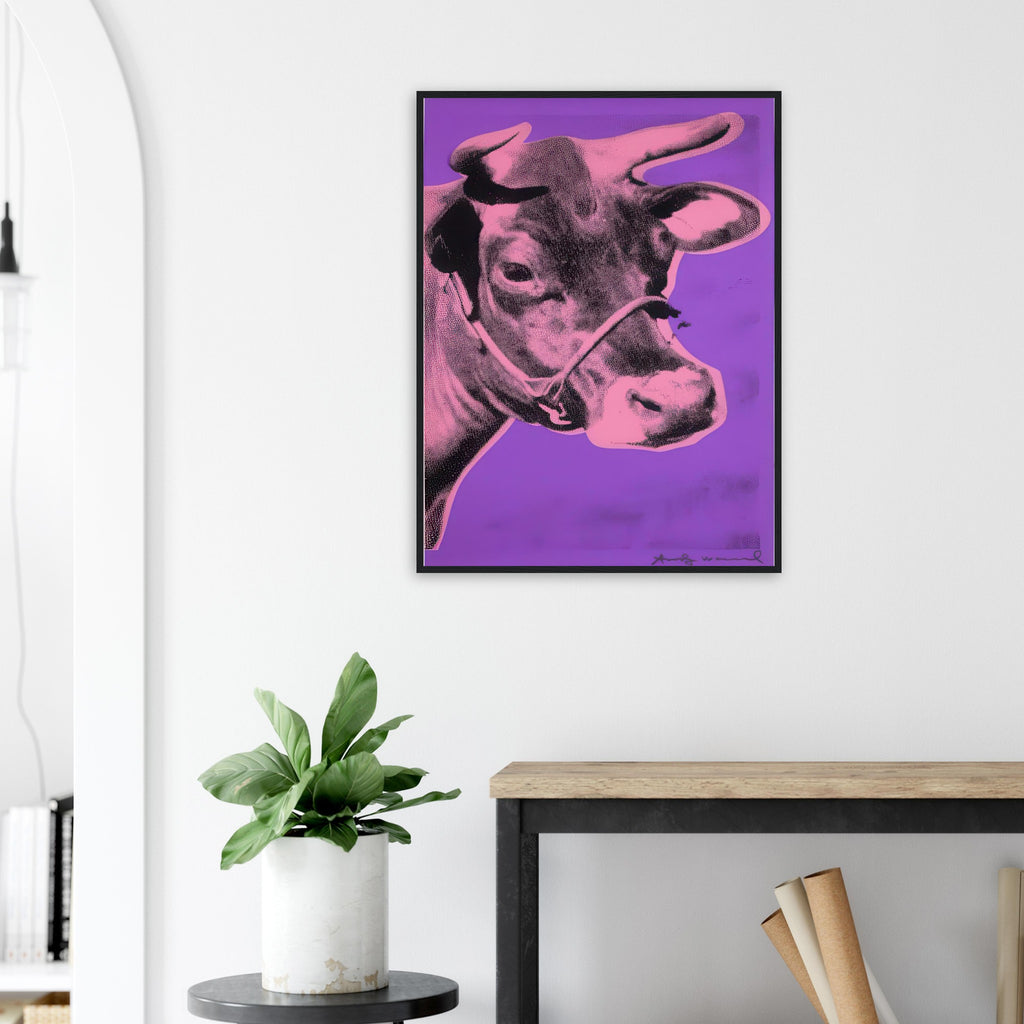 Andy Warhol framed print depicting the cow’s face becomes a bold graphic presence, replacing the gentle mood of traditional animal painting with irreverent visual impact