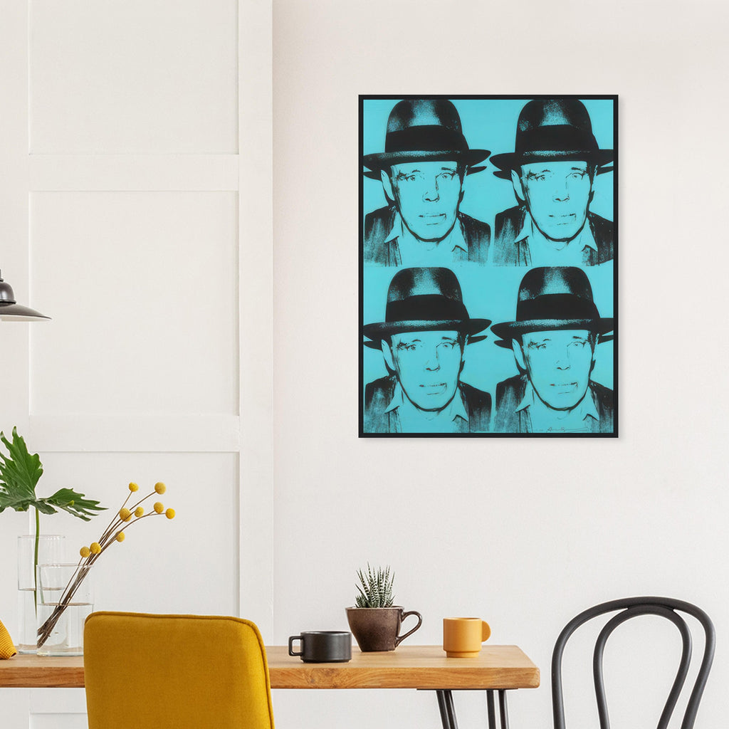 Andy Warhol framed print depicting a 2-by-2 arrangement repeats the felt-hatted face; black forms sit against cyan blue, producing a relatively restrained portrait; Warhol portrayed fellow artist Joseph Beuys after photographing him in 1979