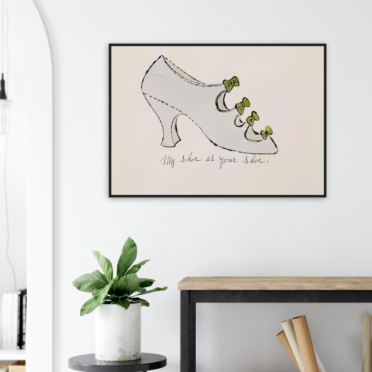 Andy Warhol framed print depicting playfully drawn footwear with expressive line work, a detail that connects the composition to its broader artistic subject