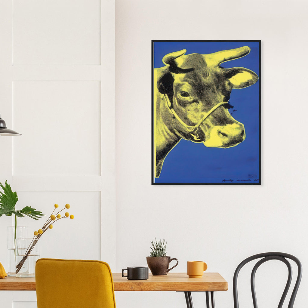 Andy Warhol framed print depicting the cow’s face becomes a bold graphic presence, replacing the gentle mood of traditional animal painting with irreverent visual impact