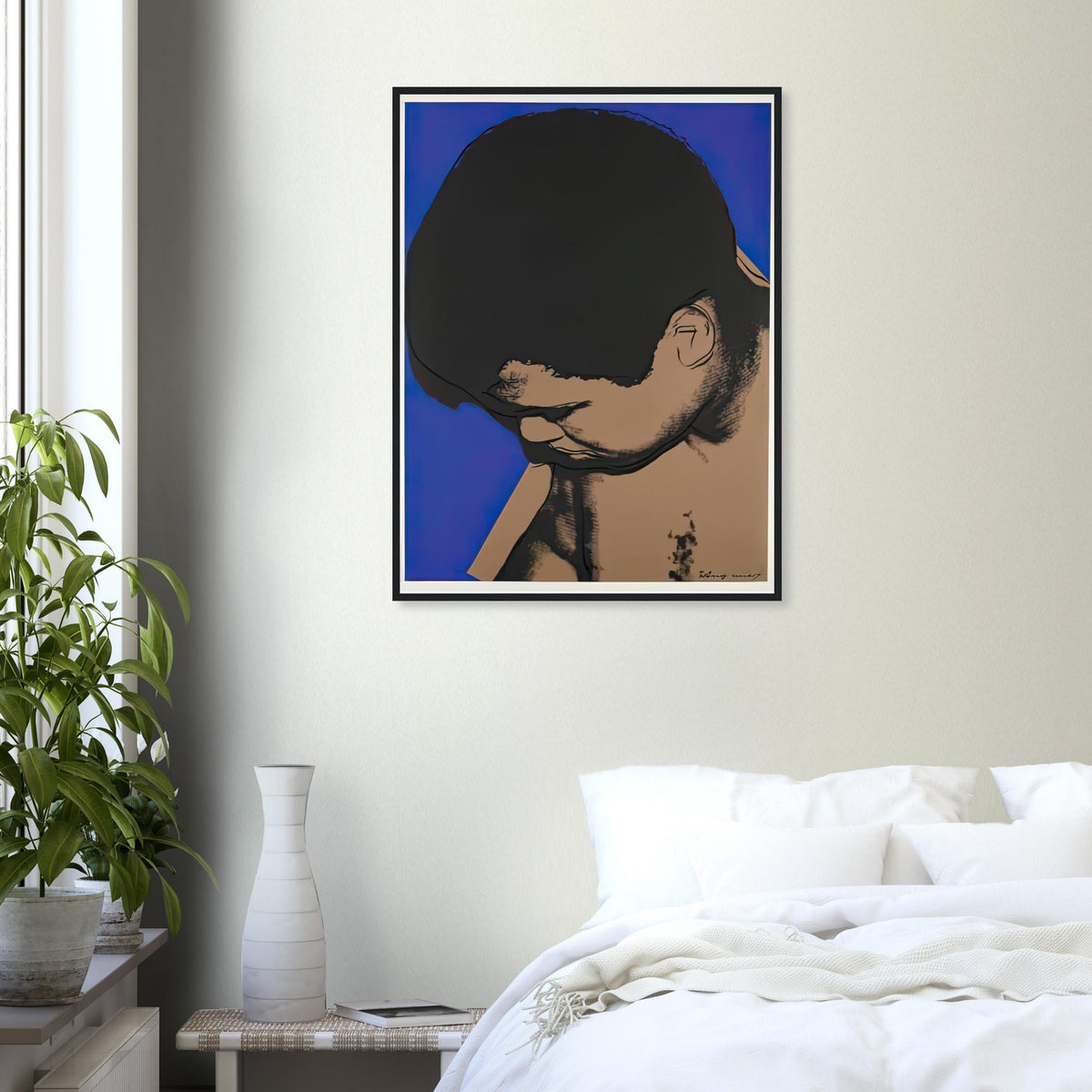Andy Warhol framed print depicting ali lowers his head toward the left as cobalt blue frames the shoulders and face, making his expression partly hidden; The Muhammad Ali portfolio was developed from Warhol’s photographs of the celebrated boxer after sports
