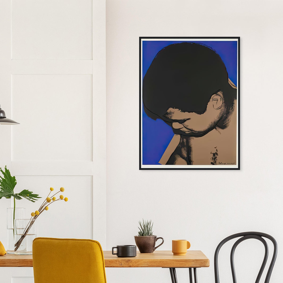 Andy Warhol framed print depicting ali lowers his head toward the left as cobalt blue frames the shoulders and face, making his expression partly hidden; The Muhammad Ali portfolio was developed from Warhol’s photographs of the celebrated boxer after sports