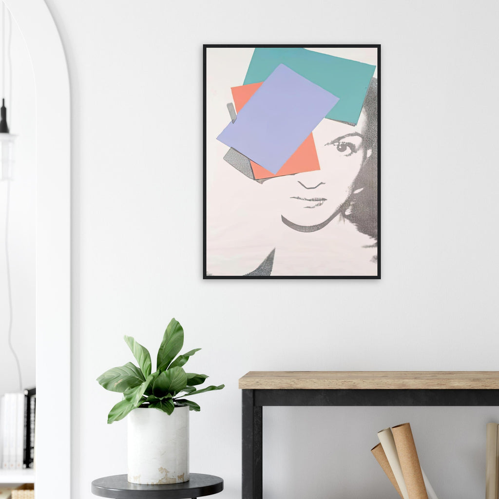 Andy Warhol framed print depicting the central face is treated as a graphic emblem, with selective contour and colour drawing attention to the sitter’s expression and composed presence; Paloma Picasso, daughter of Pablo Picasso, was a figure in the international fashion and art worlds