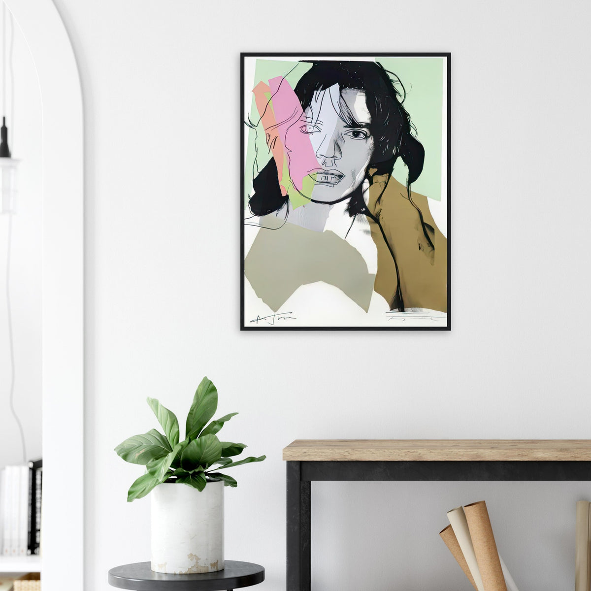 Andy Warhol framed print depicting only fragments of the original photographic shading and hair are retained beneath reintroduced outlines and collage-like colour shapes; Warhol’s ten Mick Jagger portraits followed a long friendship with the Rolling Stones singer, including