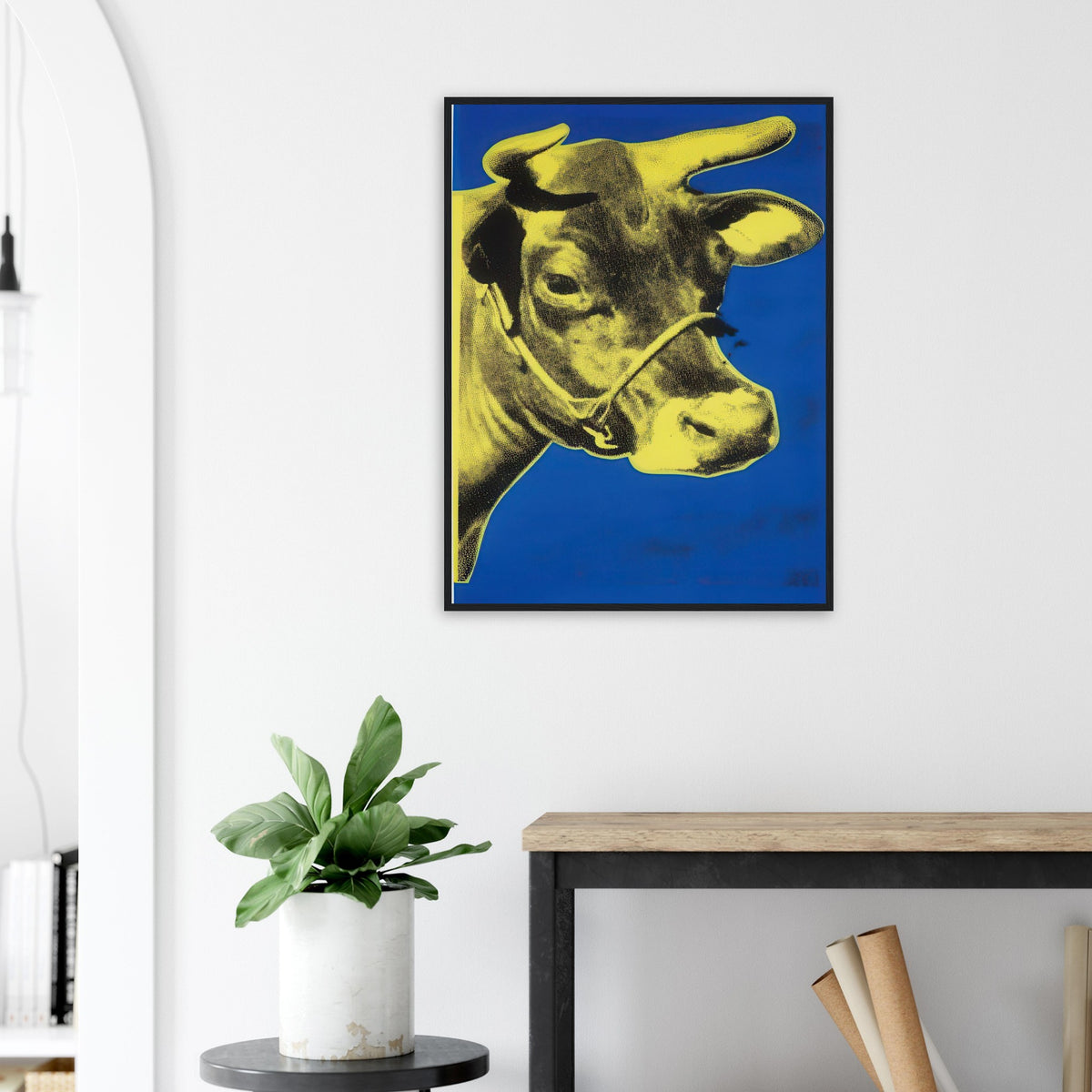 Andy Warhol framed print depicting the cow’s face becomes a bold graphic presence, replacing the gentle mood of traditional animal painting with irreverent visual impact