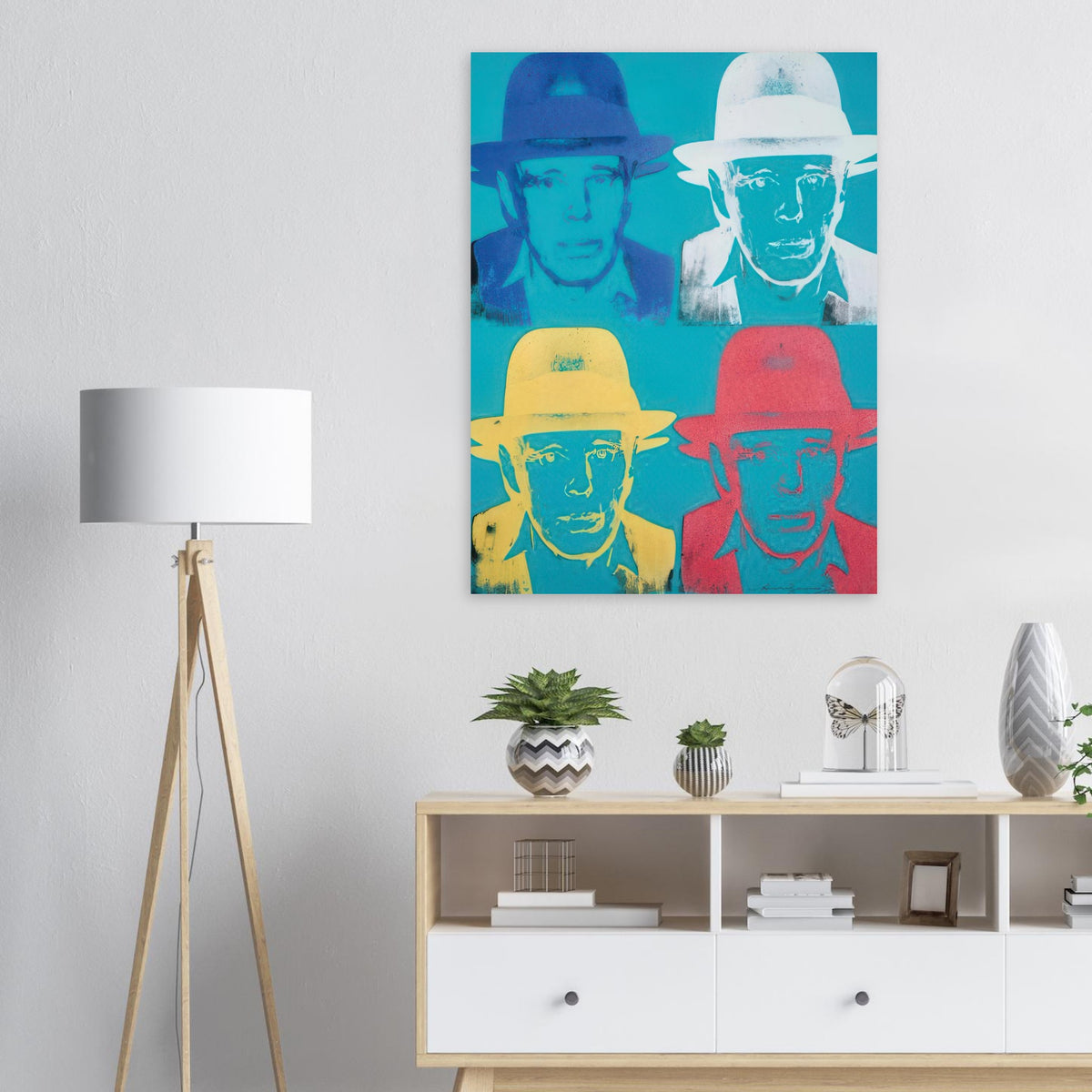 Andy Warhol poster depicting the portrait is direct and intense: the hat and centered face make Beuys recognizable, while the print’s graphic treatment pushes the likeness toward iconography