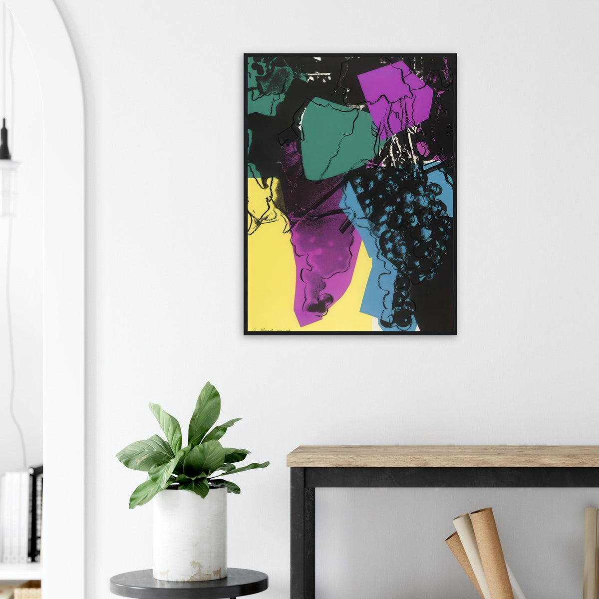 Andy Warhol framed print depicting rounded grape forms and flowing stems provide a decorative rhythm, while the composition feels more graphic than naturalistic