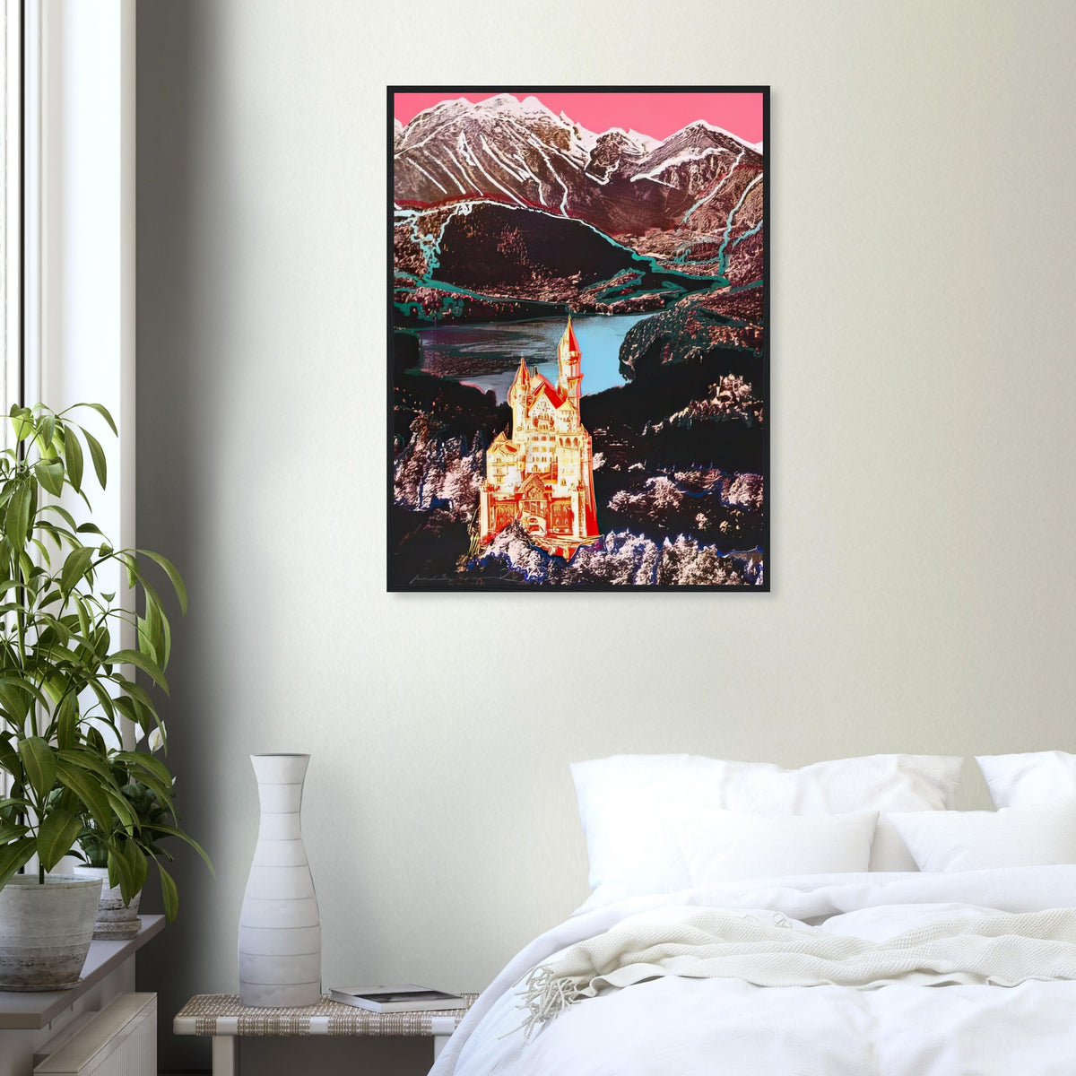 Andy Warhol framed print depicting the Bavarian castle glows in orange-red and yellow above a lake, while blue outlines and a bright-pink sky dominate the Alpine setting; Warhol’s image of Neuschwanstein Castle translates a heavily photographed Bavarian landmark into Pop Art