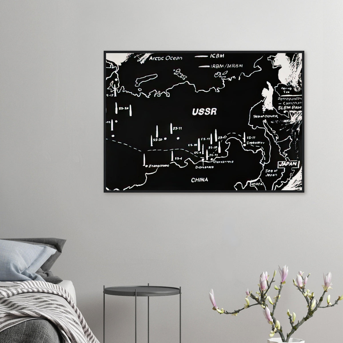 Andy Warhol framed print depicting cartographic outlines and strategic map markings, a detail that connects the composition to its broader artistic subject