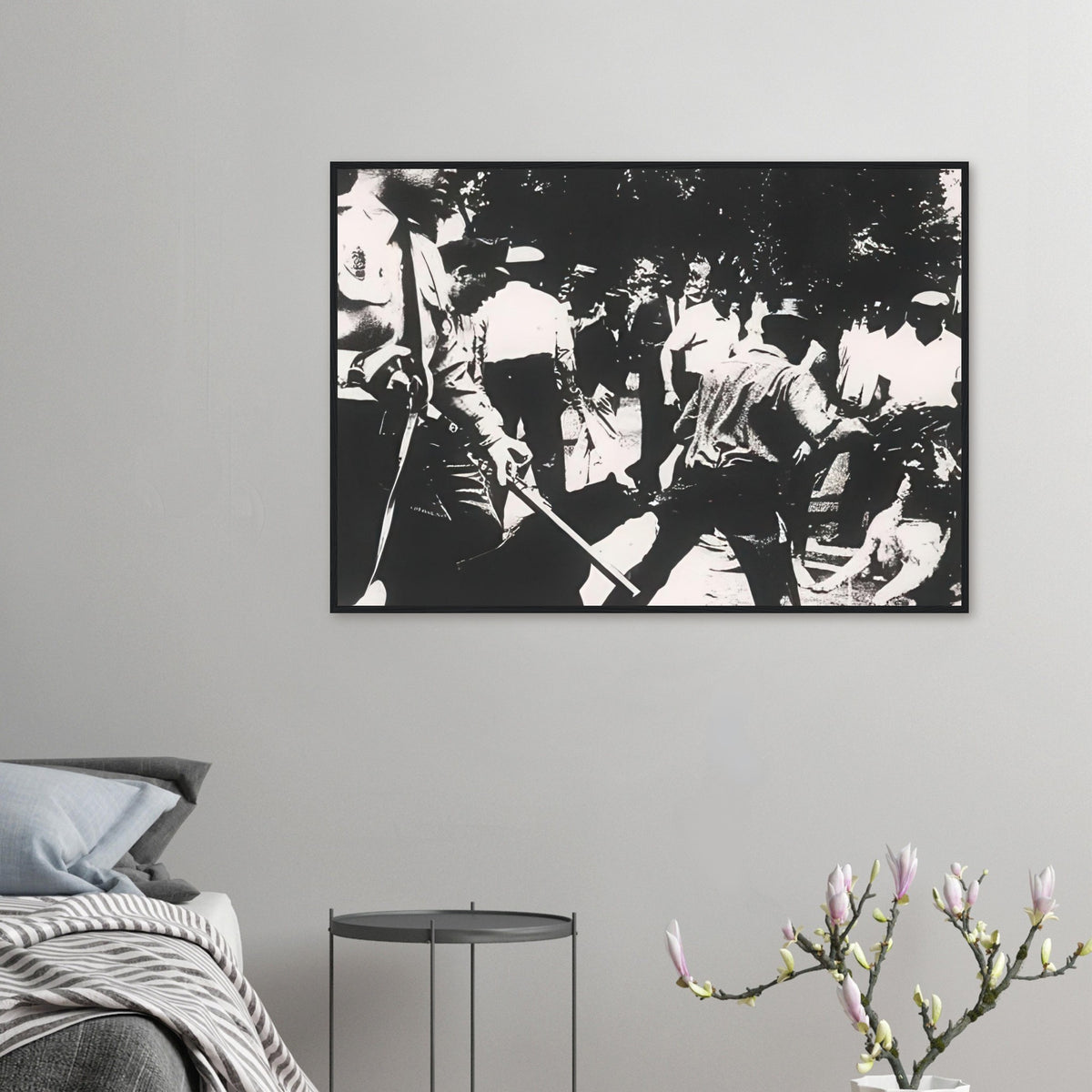 Andy Warhol framed print depicting the tense scene of a civil-rights protest and its violent repression, a detail that connects the composition to its broader artistic subject