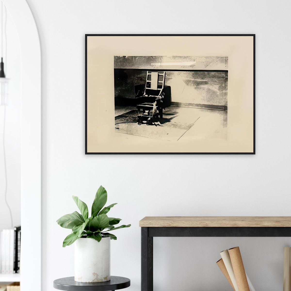 Andy Warhol framed print depicting the stark chair, its surroundings and the tense emptiness of the room, a detail that connects the composition to its broader artistic subject