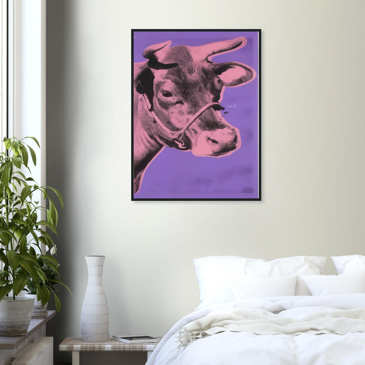 Andy Warhol framed print depicting the cow’s face becomes a bold graphic presence, replacing the gentle mood of traditional animal painting with irreverent visual impact