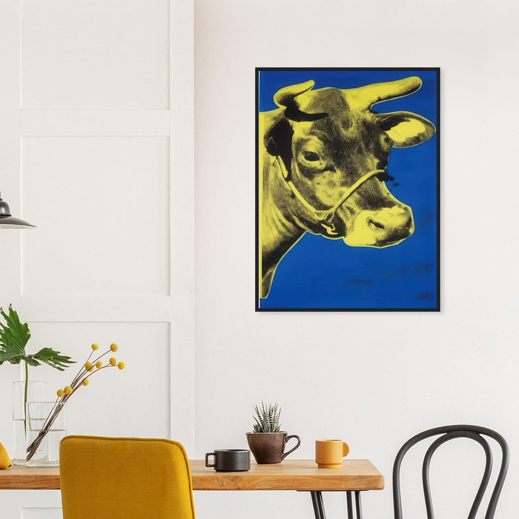 Andy Warhol framed print depicting the cow’s face becomes a bold graphic presence, replacing the gentle mood of traditional animal painting with irreverent visual impact