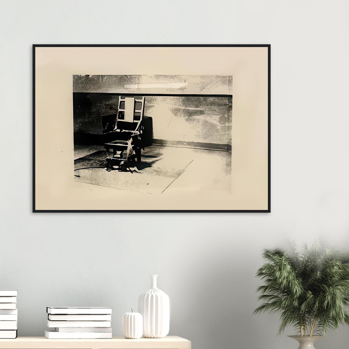 Andy Warhol framed print depicting the stark chair, its surroundings and the tense emptiness of the room, a detail that connects the composition to its broader artistic subject
