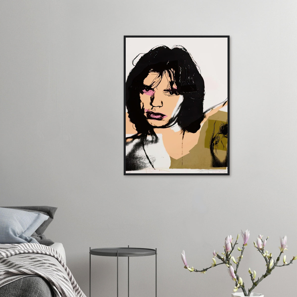 Andy Warhol framed print depicting warhol limits photographic detail and redraws facial features, giving Jagger’s lips a particularly vivid pink accent; Warhol’s ten Mick Jagger portraits followed a long friendship with the Rolling Stones singer, including
