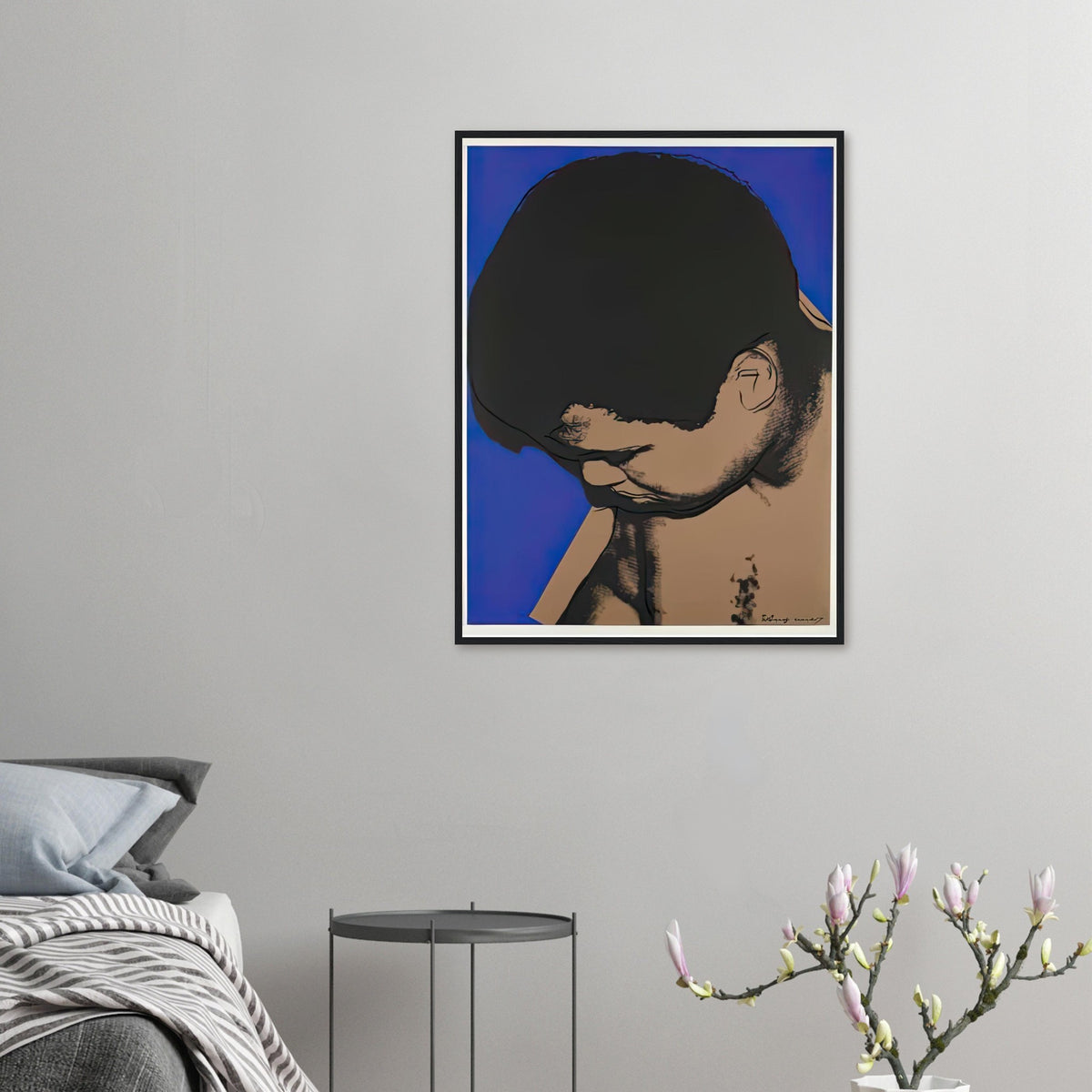 Andy Warhol framed print depicting ali lowers his head toward the left as cobalt blue frames the shoulders and face, making his expression partly hidden; The Muhammad Ali portfolio was developed from Warhol’s photographs of the celebrated boxer after sports