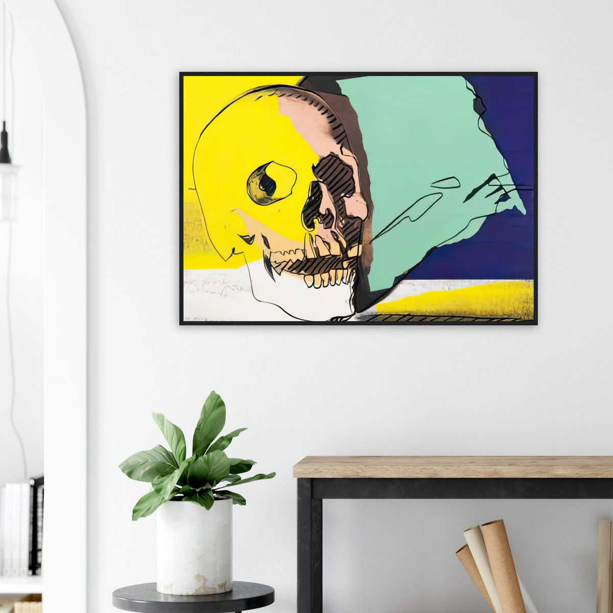 Andy Warhol framed print depicting the contours and shadow of a skull used as a direct, confronting focal point, a detail that connects the composition to its broader artistic subject