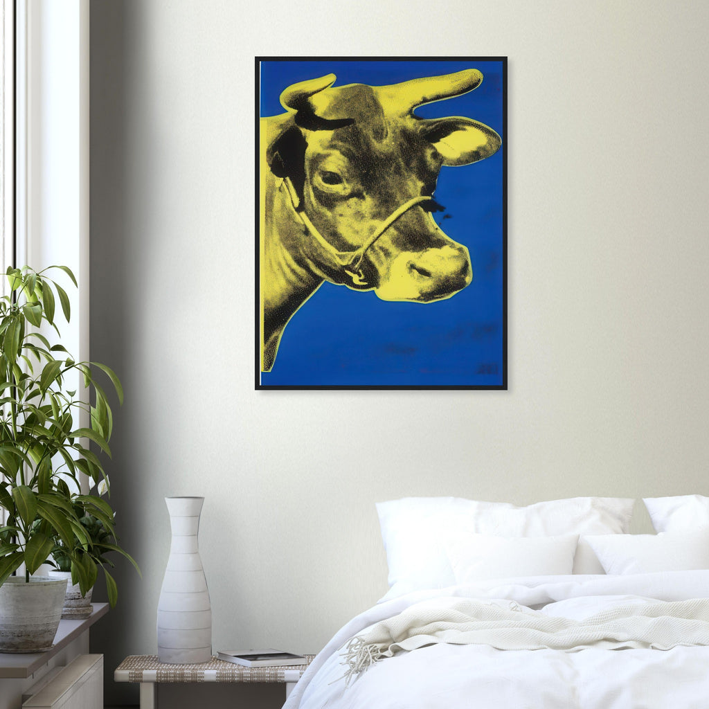Andy Warhol framed print depicting the cow’s face becomes a bold graphic presence, replacing the gentle mood of traditional animal painting with irreverent visual impact