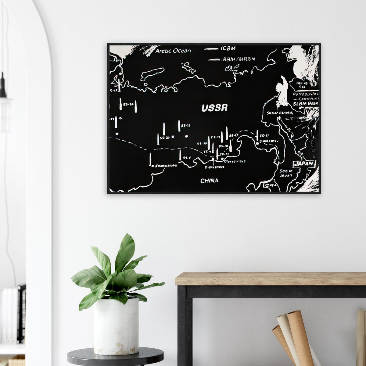 Andy Warhol framed print depicting cartographic outlines and strategic map markings, a detail that connects the composition to its broader artistic subject