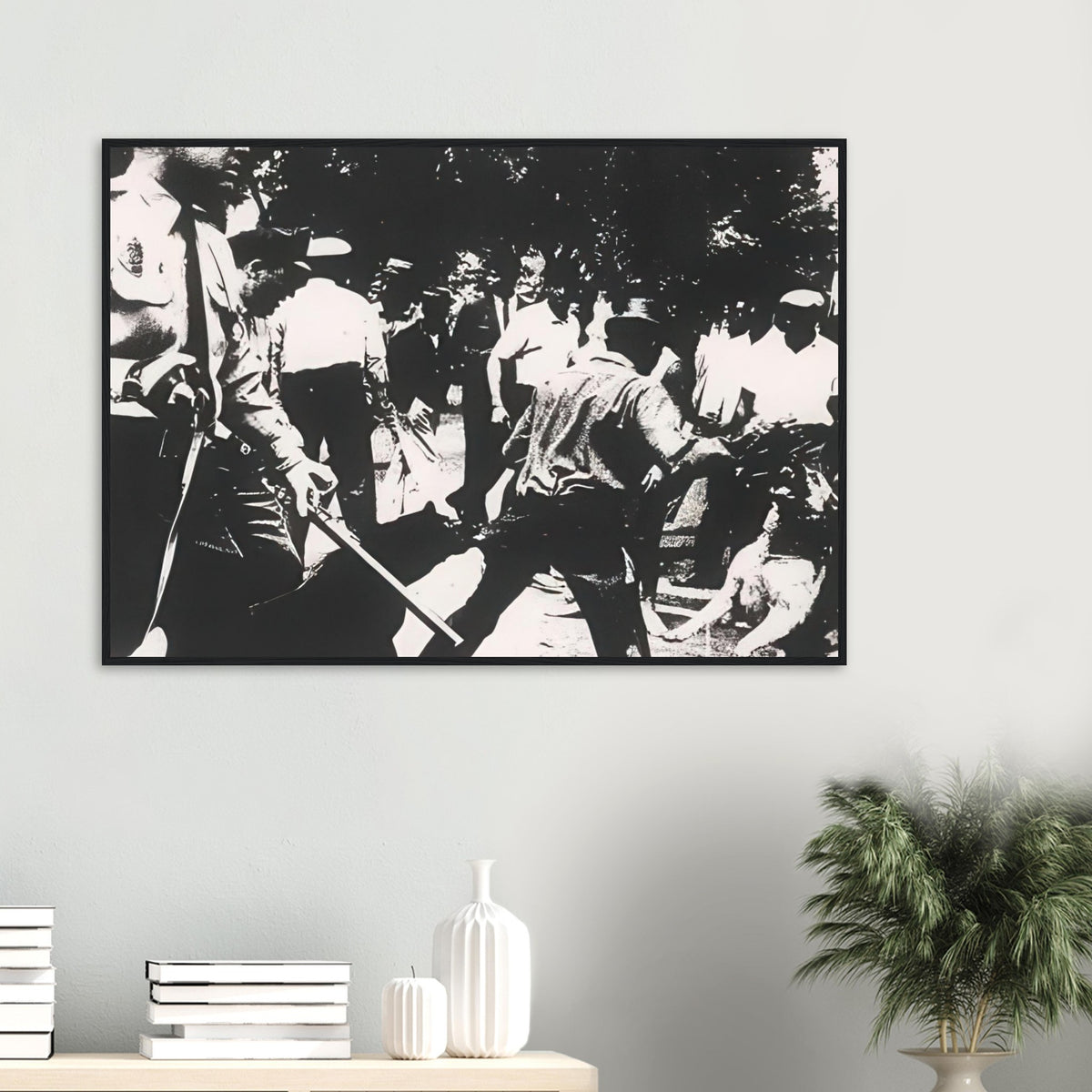 Andy Warhol framed print depicting the tense scene of a civil-rights protest and its violent repression, a detail that connects the composition to its broader artistic subject