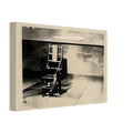 Andy Warhol canvas print depicting the stark chair, its surroundings and the tense emptiness of the room, a detail that connects the composition to its broader artistic subject, 20x30 cm / 8x12″