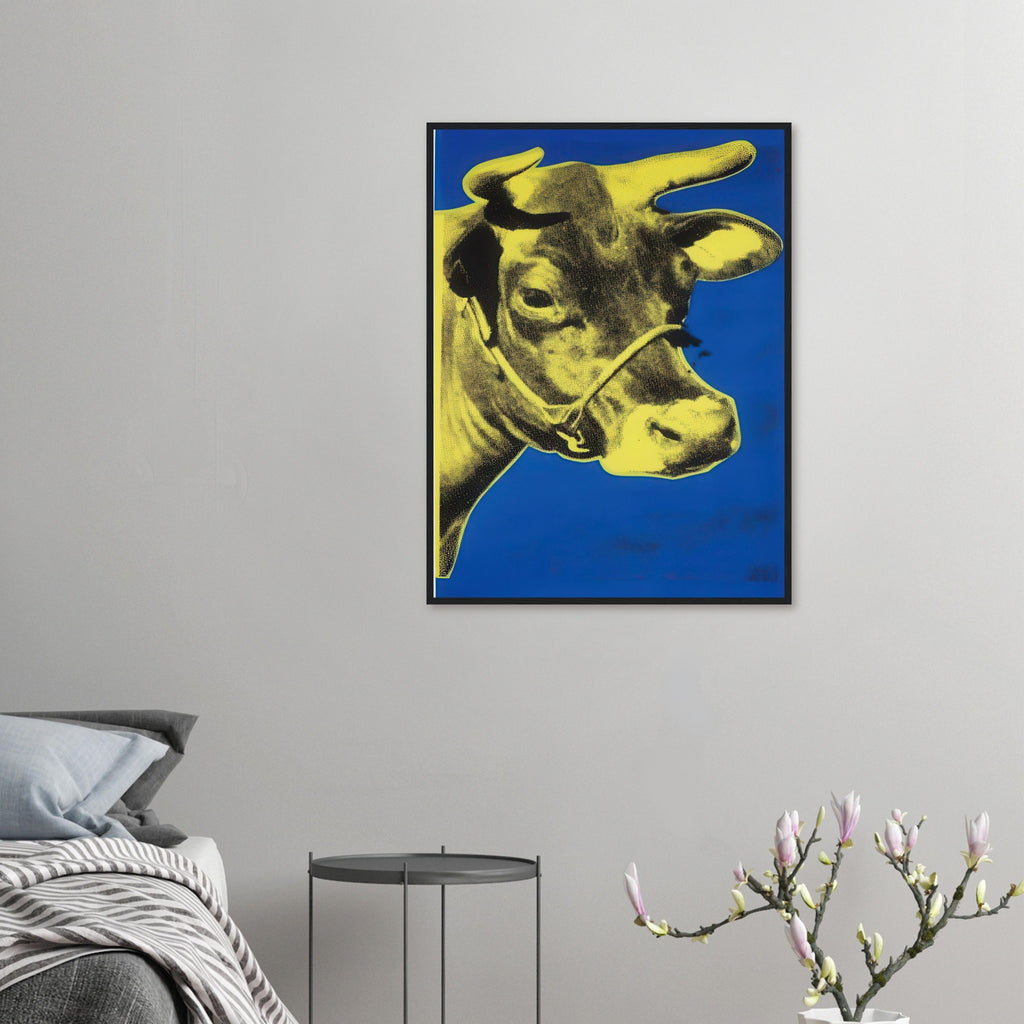 Andy Warhol framed print depicting the cow’s face becomes a bold graphic presence, replacing the gentle mood of traditional animal painting with irreverent visual impact