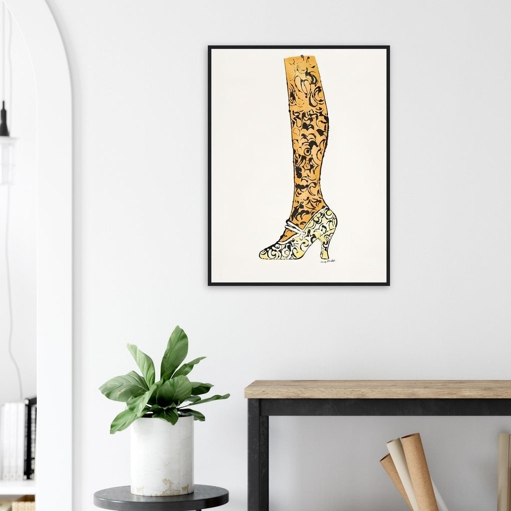 Andy Warhol framed print depicting a bright yellow high heel, golden-toned leg and black paisley decoration make an elegant fashion drawing feel witty and theatrical; Shoe and Leg comes from Warhol’s commercial-illustration era and the witty La Recherche du Shoe Perdu