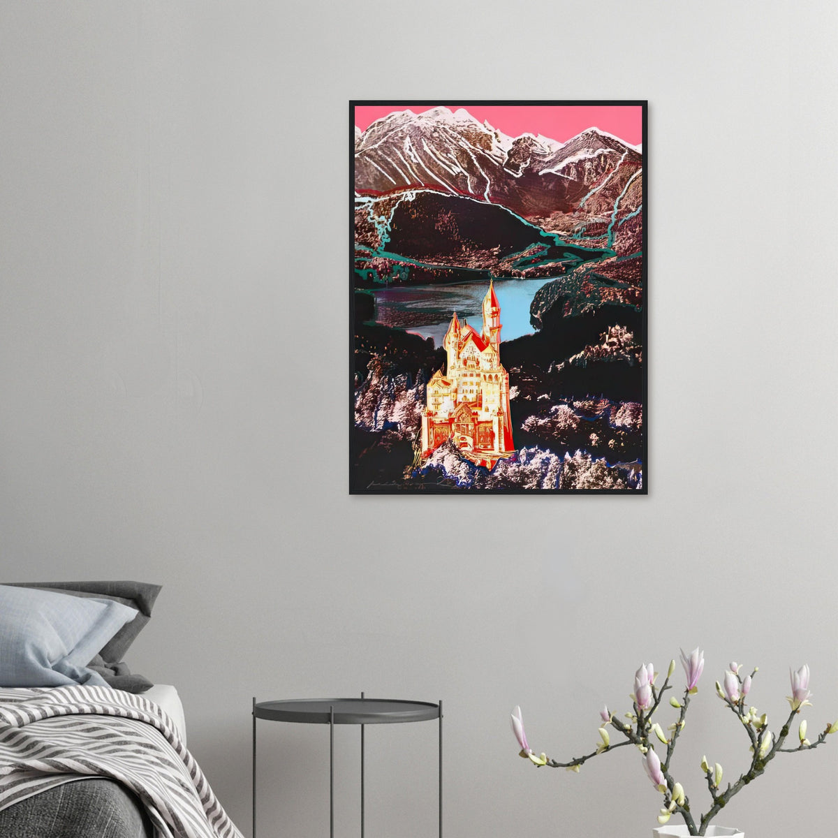 Andy Warhol framed print depicting the Bavarian castle glows in orange-red and yellow above a lake, while blue outlines and a bright-pink sky dominate the Alpine setting; Warhol’s image of Neuschwanstein Castle translates a heavily photographed Bavarian landmark into Pop Art